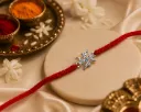 Silver Finish Clear Zirconia Rakhi Bracelet with Swastika Centerpiece